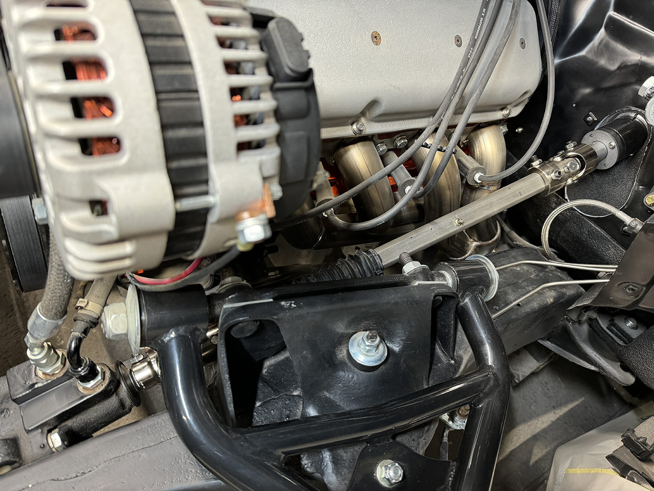 019 1971 Camaro steering shaft installed with dual U joints and tight clearance near headers