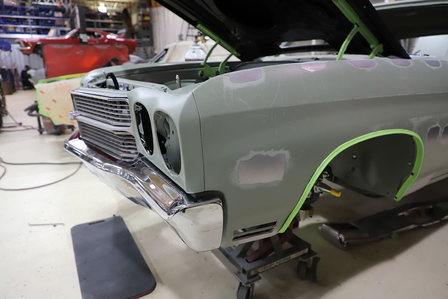 02 1970 Chevelle bodywork in primer with filler spots and taped edges for panel fit