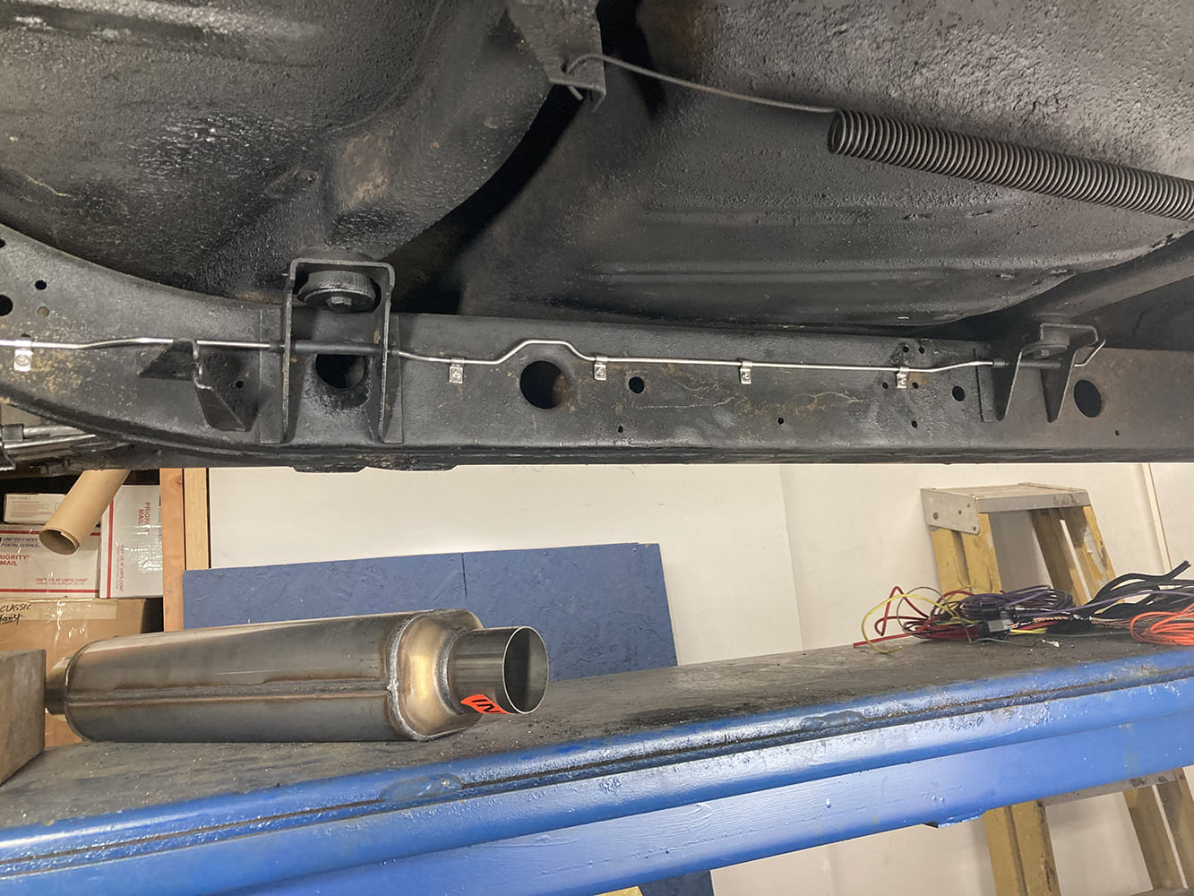 020 Stainless brake line precisely routed along rear frame rail using cushioned clamps