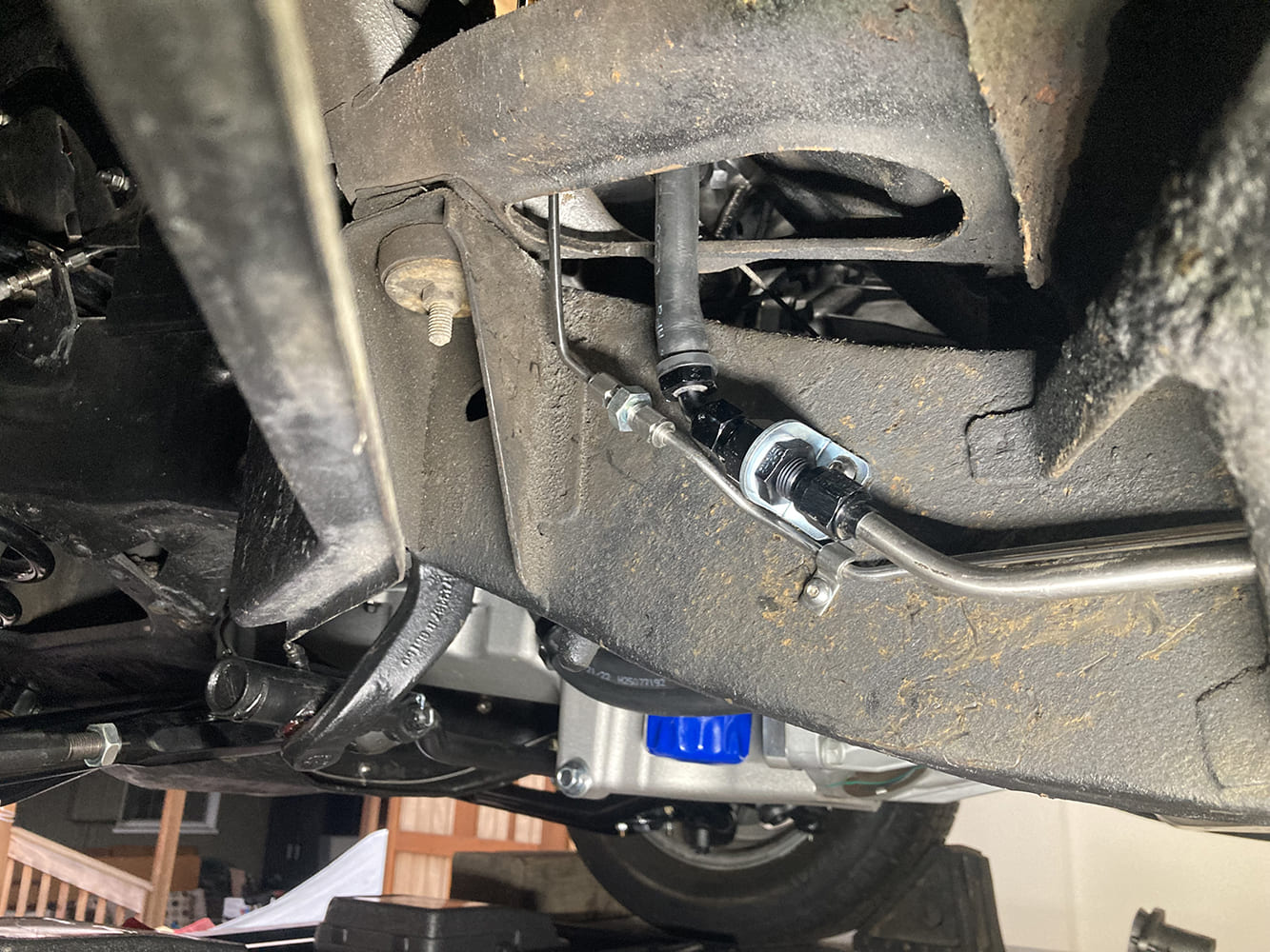022 Fuel or brake line passes through frame using bulkhead fitting and stainless tubing