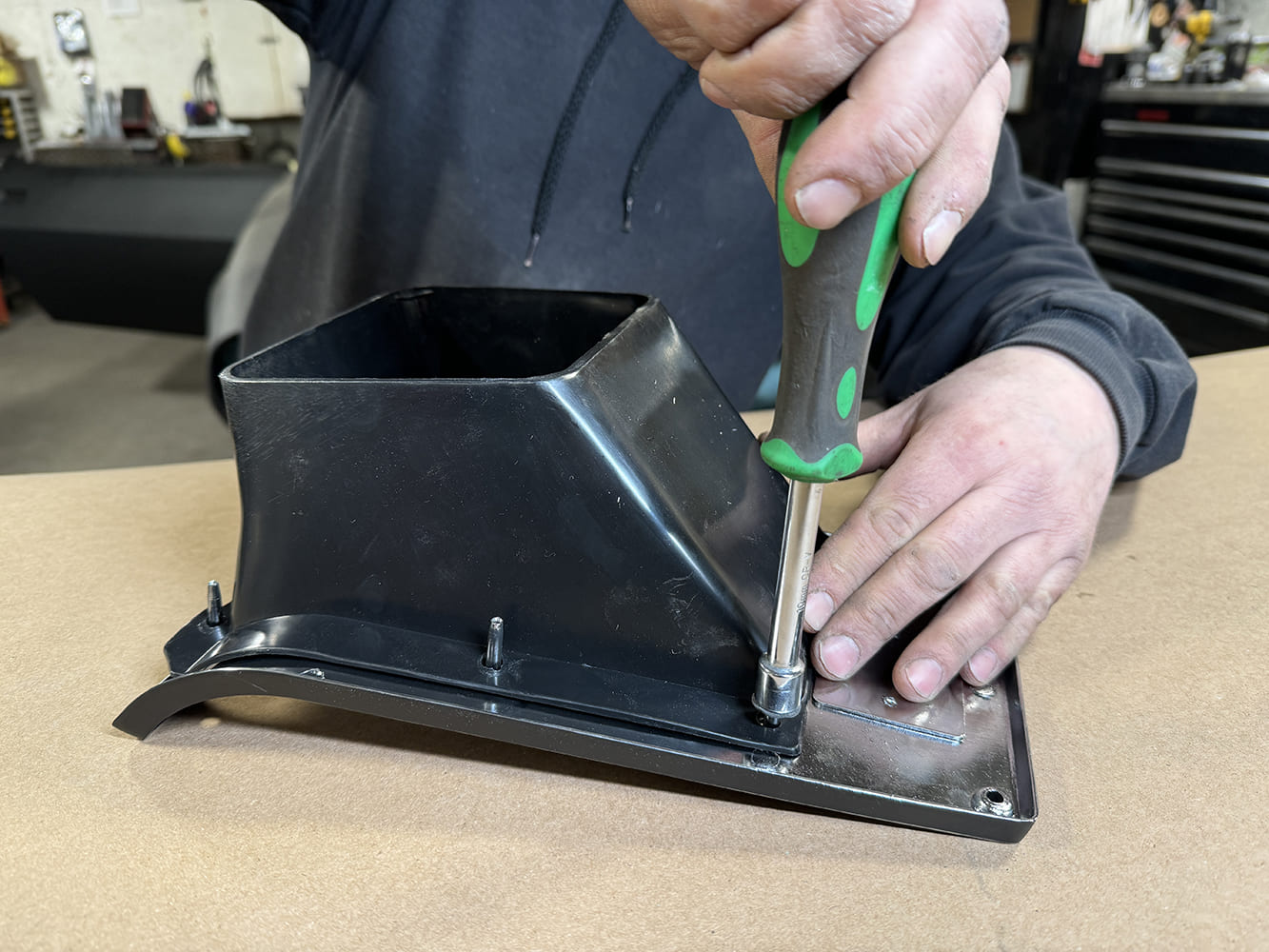 025 1971 Camaro HVAC vent assembly being reattached to factory console panel