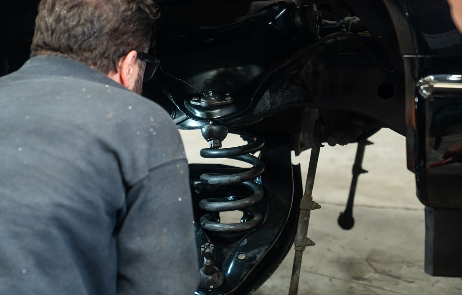 03 Lower coil spring and new upper control arm installed suspension being reassembled