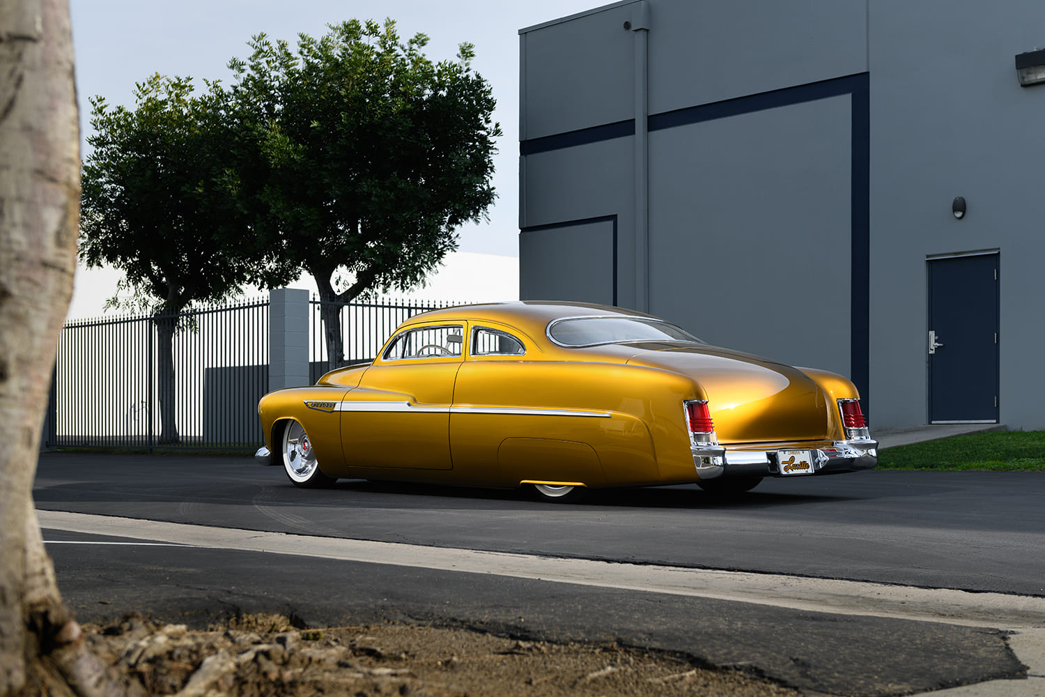 04 1951 Mercury Custom with shaved trim and integrated tail fins in sleek custom form