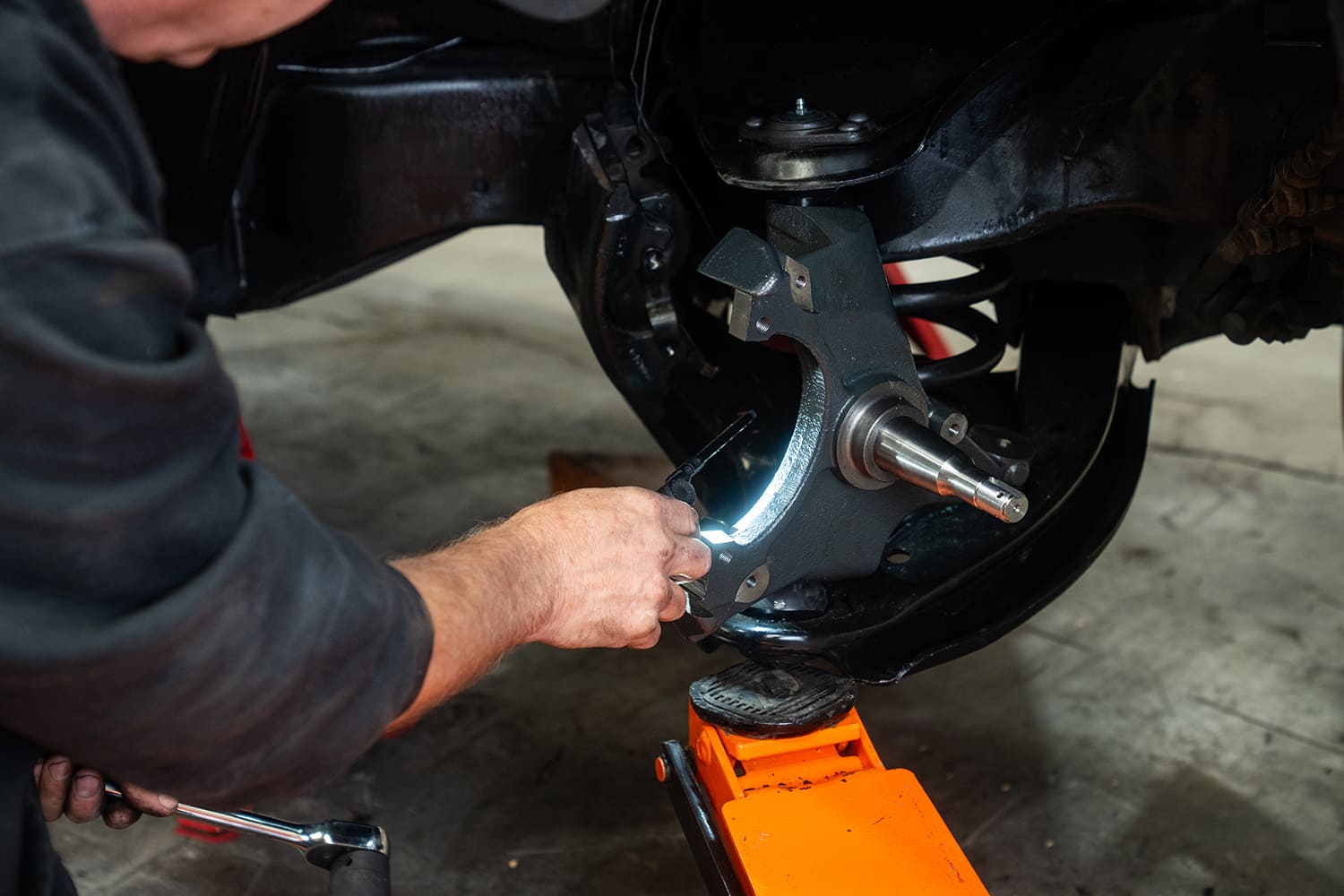 04 New drop spindle being test fit to lower control arm during suspension update