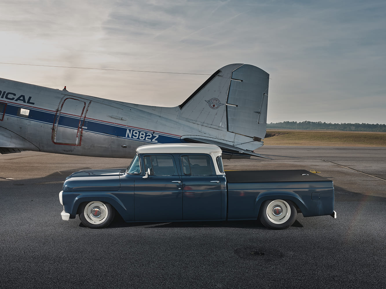 06 1960 Ford F 250 crew cab side profile stance slammed custom pickup airport airplane tail