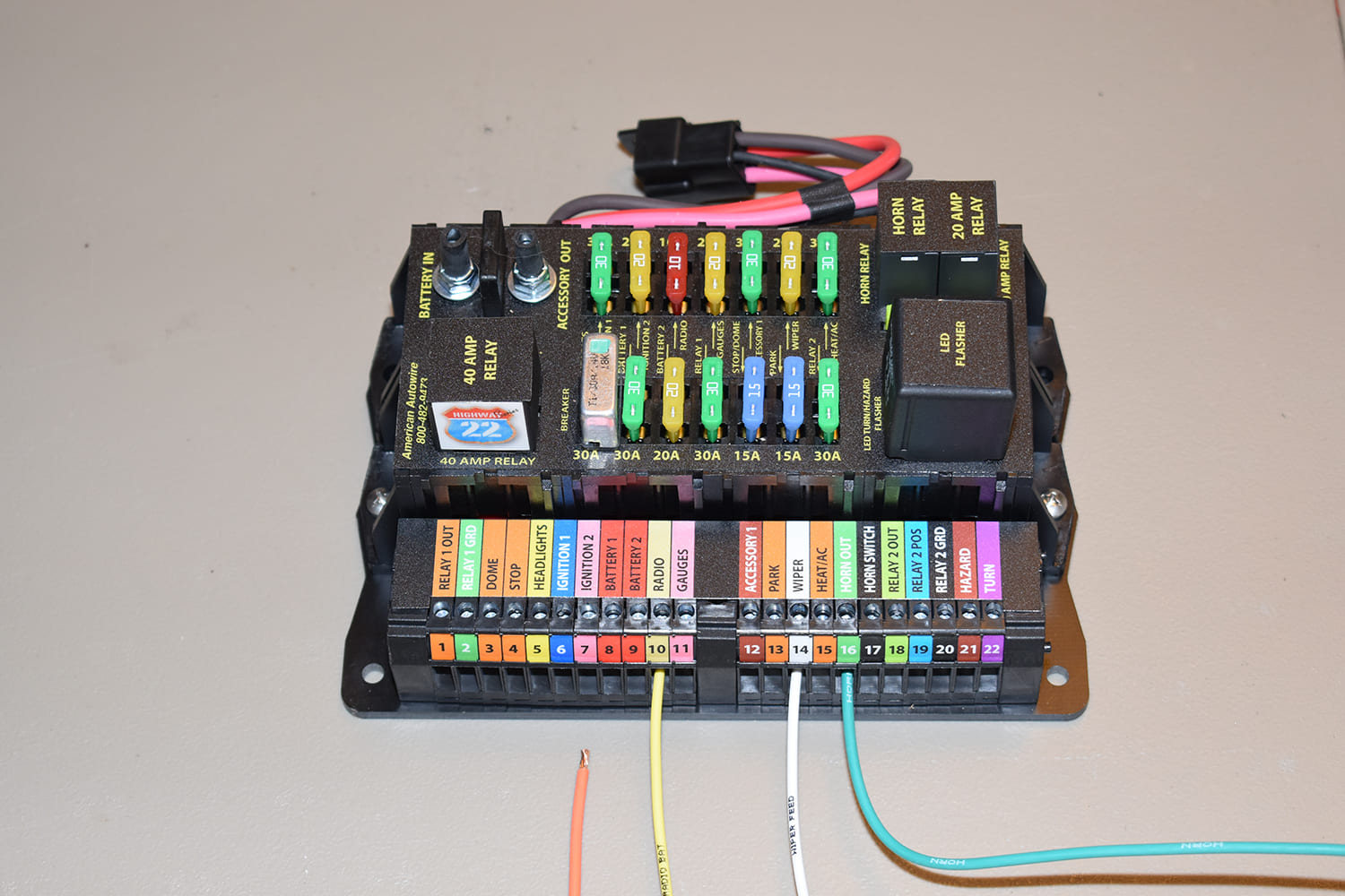 06 Highway 22 series fuse panel from American Autowire with labeled terminal indexing