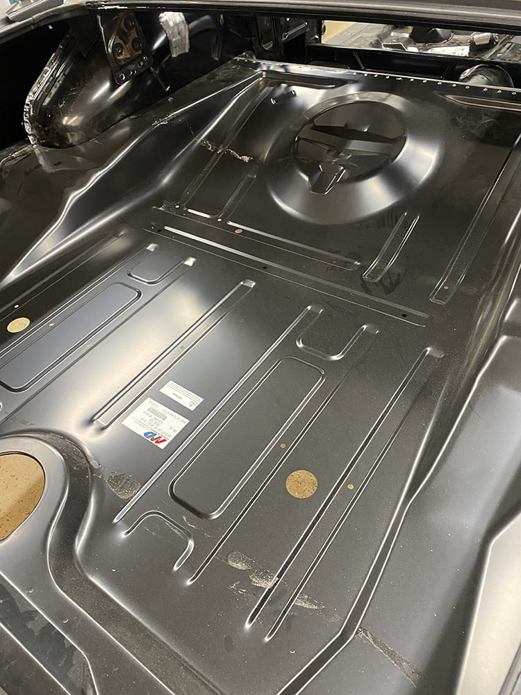 07 New reproduction trunk floor pan installed on 1963 Galaxie body restoration
