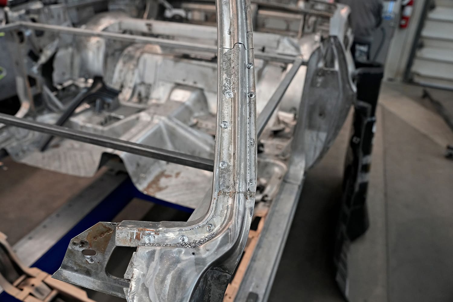07 detailed shot of plug welds along newly installed pillar seam