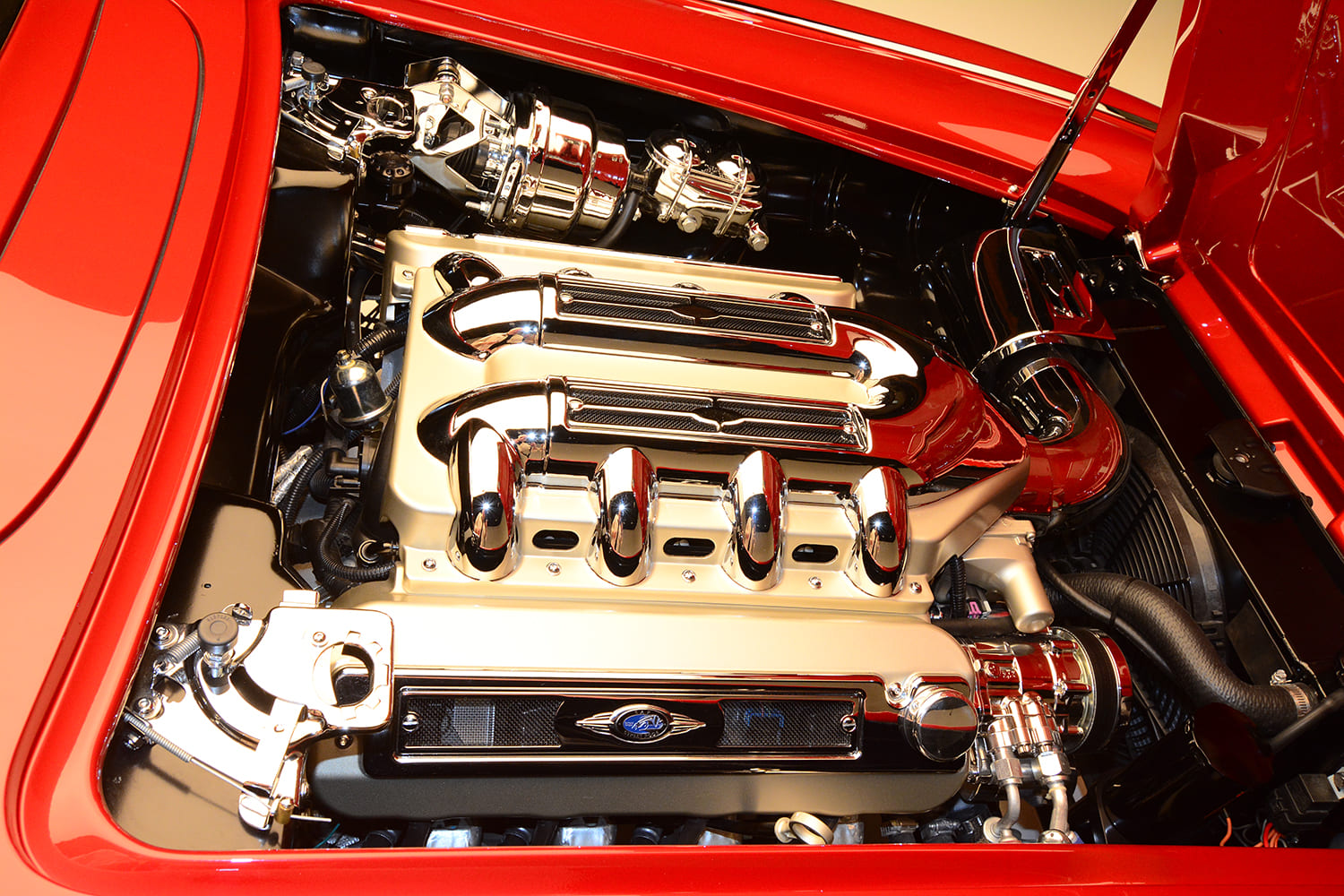 08 1962 Corvette engine bay features a polished Ford V8 with custom billet covers and hidden accessories