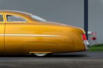 09 1951 Mercury Custom rear fender with molded skirts and shaved handles