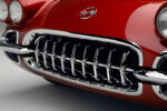 09 1962 Corvette grille showcases classic shark tooth chrome design under a cross flags emblem