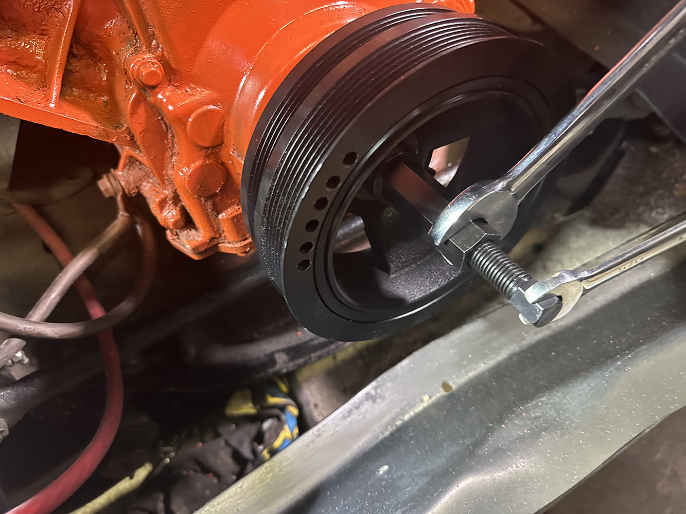 09 New crank pulley being installed using the ARP tool and dual wrench method