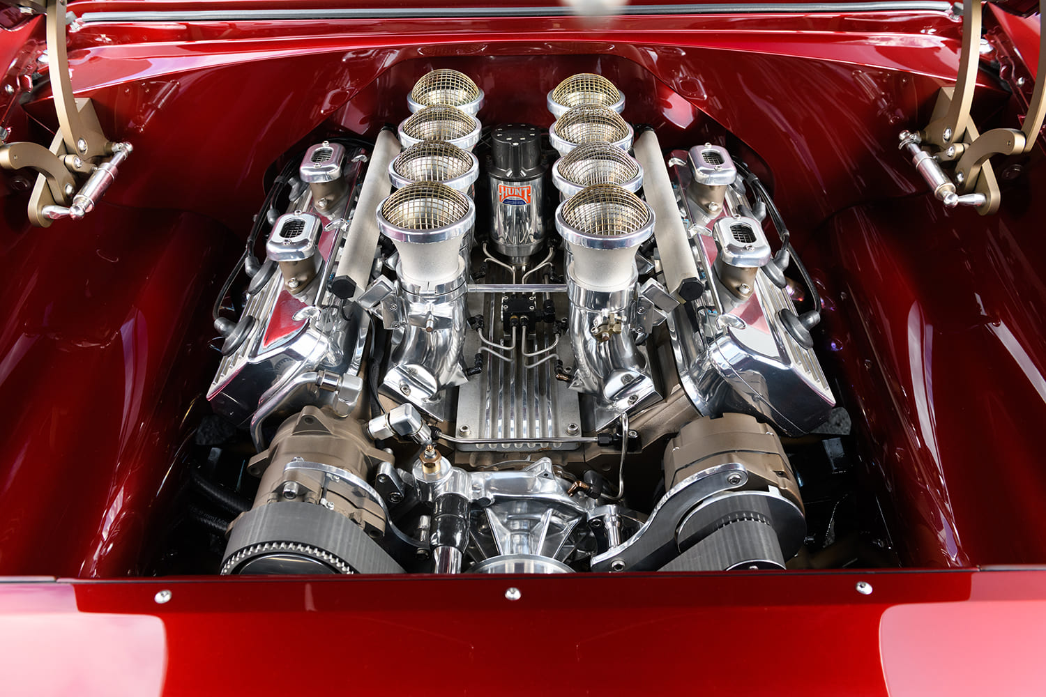 10 1955 Chevy Custom engine bay features a highly detailed V8 with individual throttle bodies and Hunt magneto