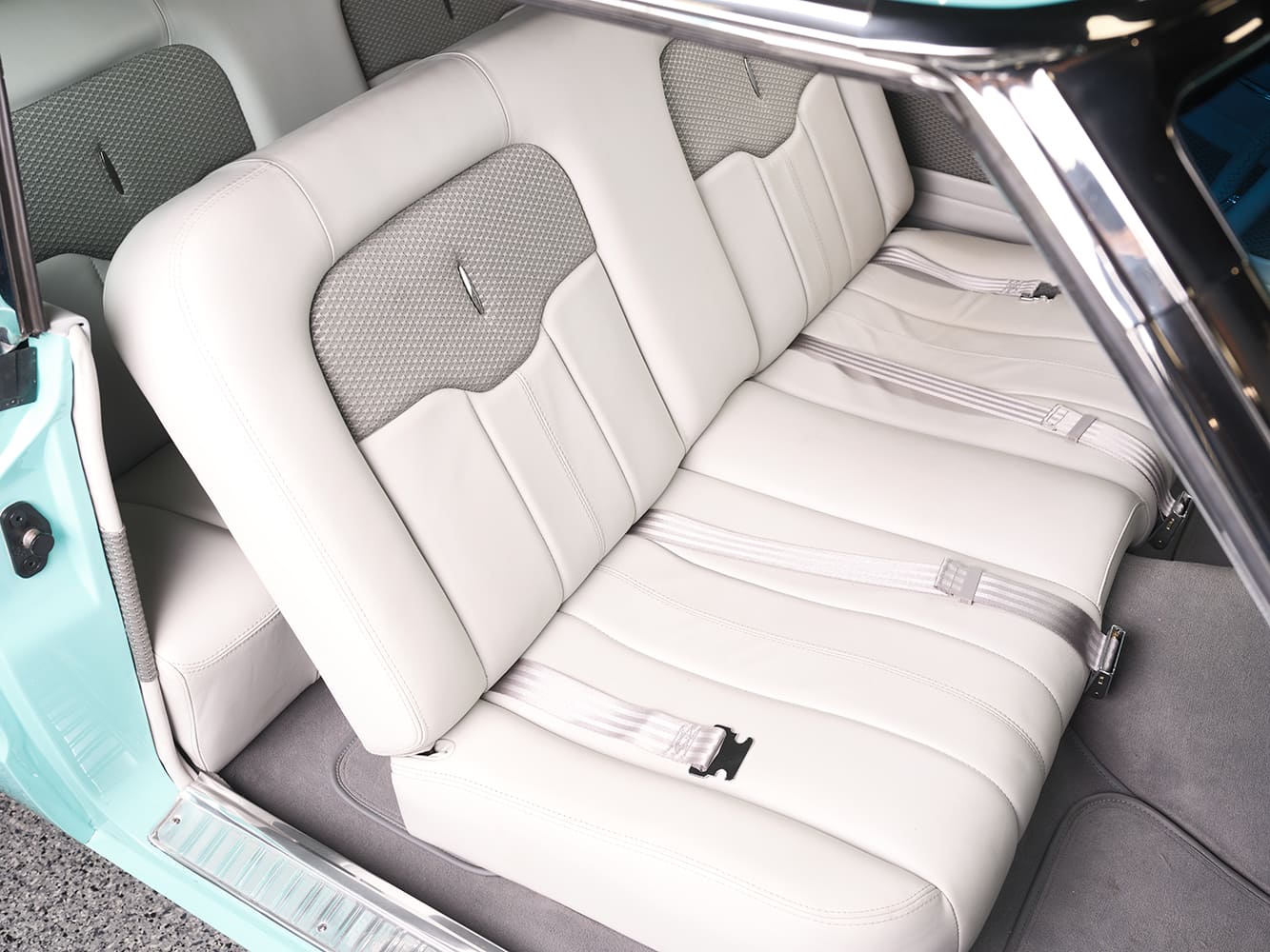 10 1963 Ford Falcon rear seats in white leather with textured inserts and lap belts