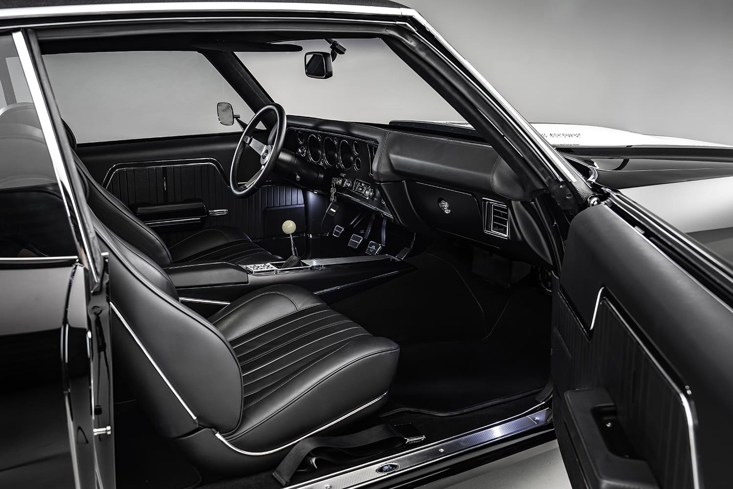 10 1970 Chevelle interior black buckets Hurst shifter Dakota Digital gauges