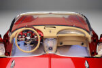 11 1962 Corvette interior showcases dual tone dash with red bezels and classic Corvette script