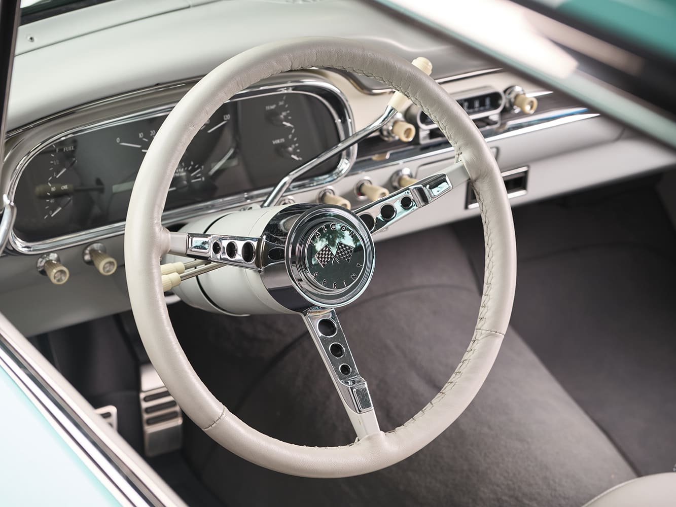 12 1963 Ford Falcon custom leather wrapped steering wheel with Falcon Sprint emblem and classic column shifter