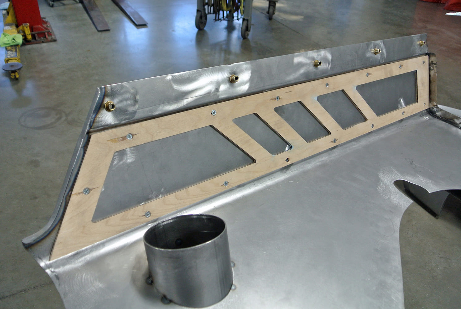 12 Full panel fitment of custom cowl with bead rolled vent insert and mounting studs