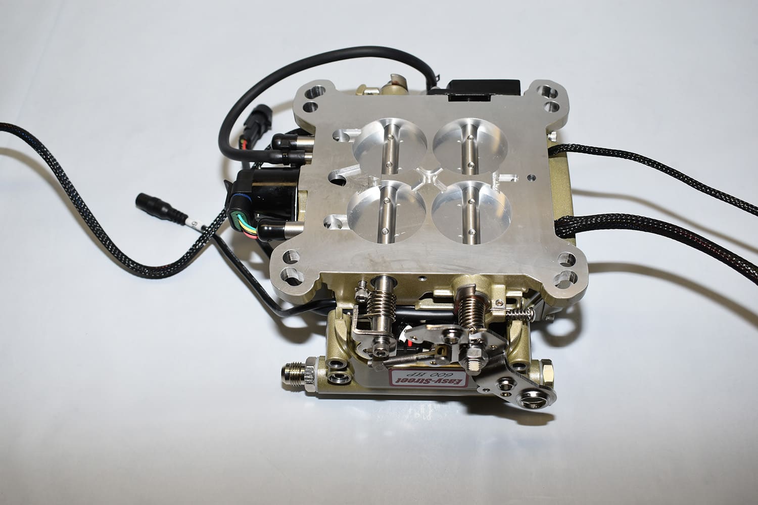 12 Top view of FiTech Go EFI throttle body showing four bore layout and integrated wiring