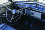 15 1939 Cadillac dash close up with original V emblem and vertical finned aluminum face