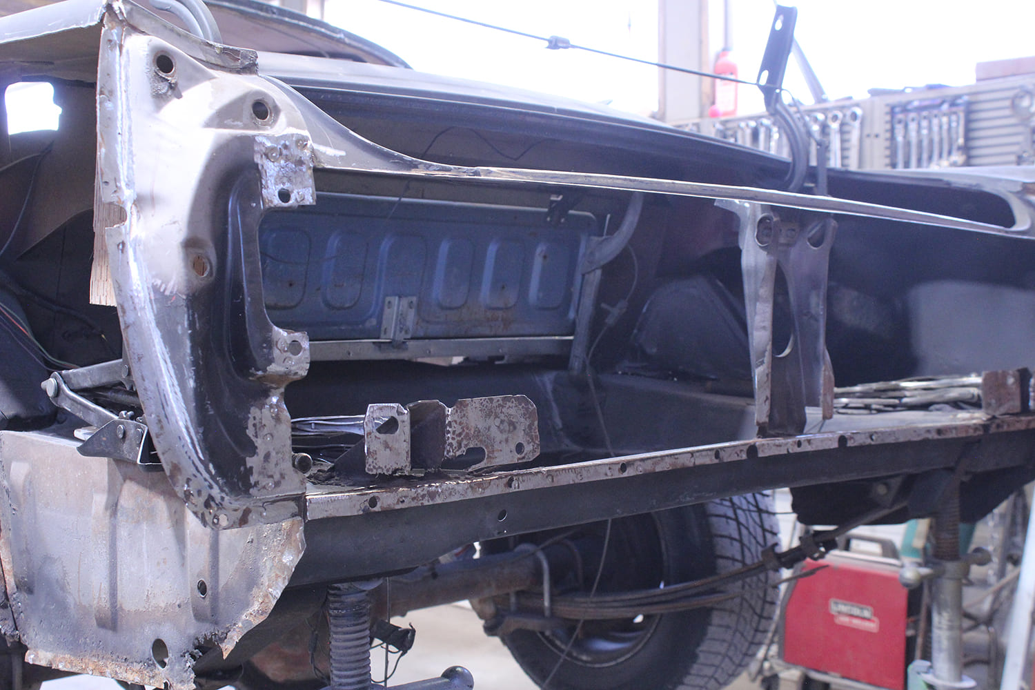 15 1965 mustang tail panel area cleaned and prepped for install
