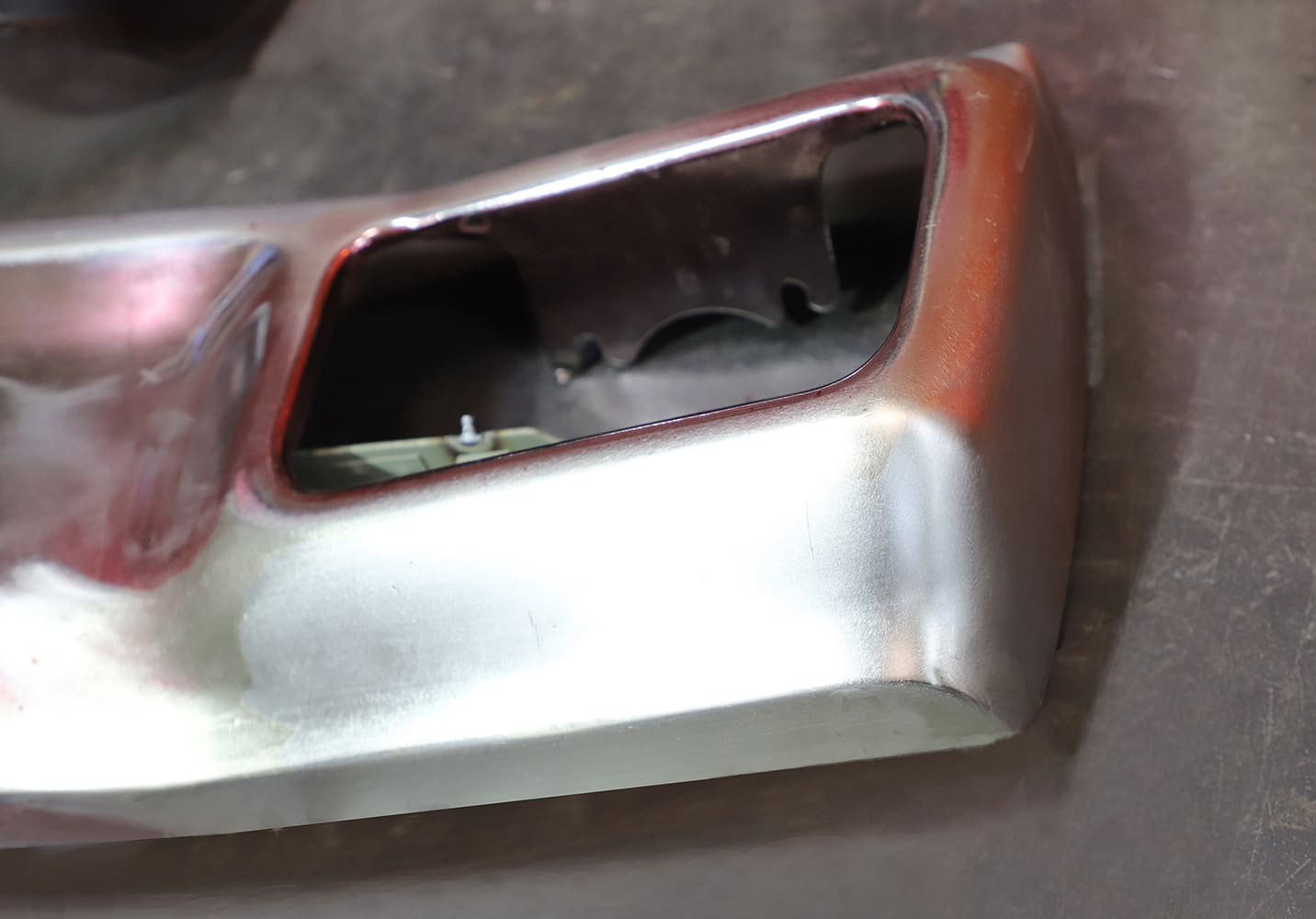 15 Rear bumper corner of 1970 Chevelle showing hand sanded metalwork transitions