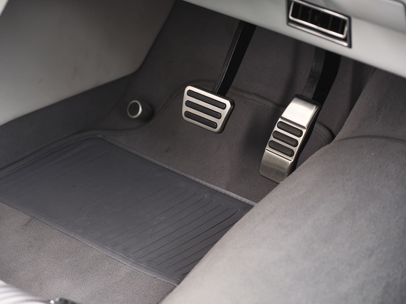 16 1963 Ford Falcon aluminum pedal set and carpeted footwell with period correct styling