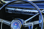 17 1939 Cadillac steering wheel with crest emblem and chrome spoke trim
