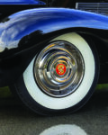 18 1939 Cadillac wide whitewall tire and chrome Cadillac crest hubcap