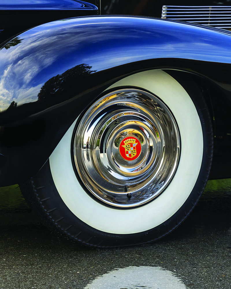 18 1939 Cadillac wide whitewall tire and chrome Cadillac crest hubcap