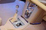 18 1962 Corvette center console includes a gated shifter and brushed aluminum HVAC panel