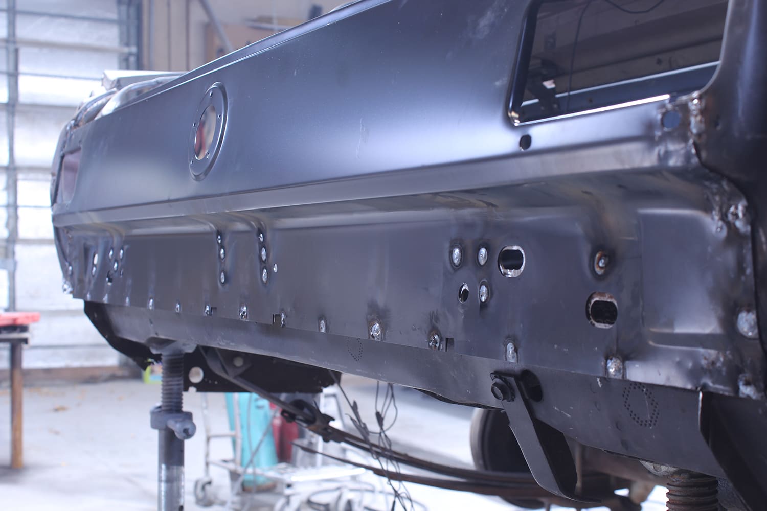 18 1965 mustang tail panel plug welded into rear body frame
