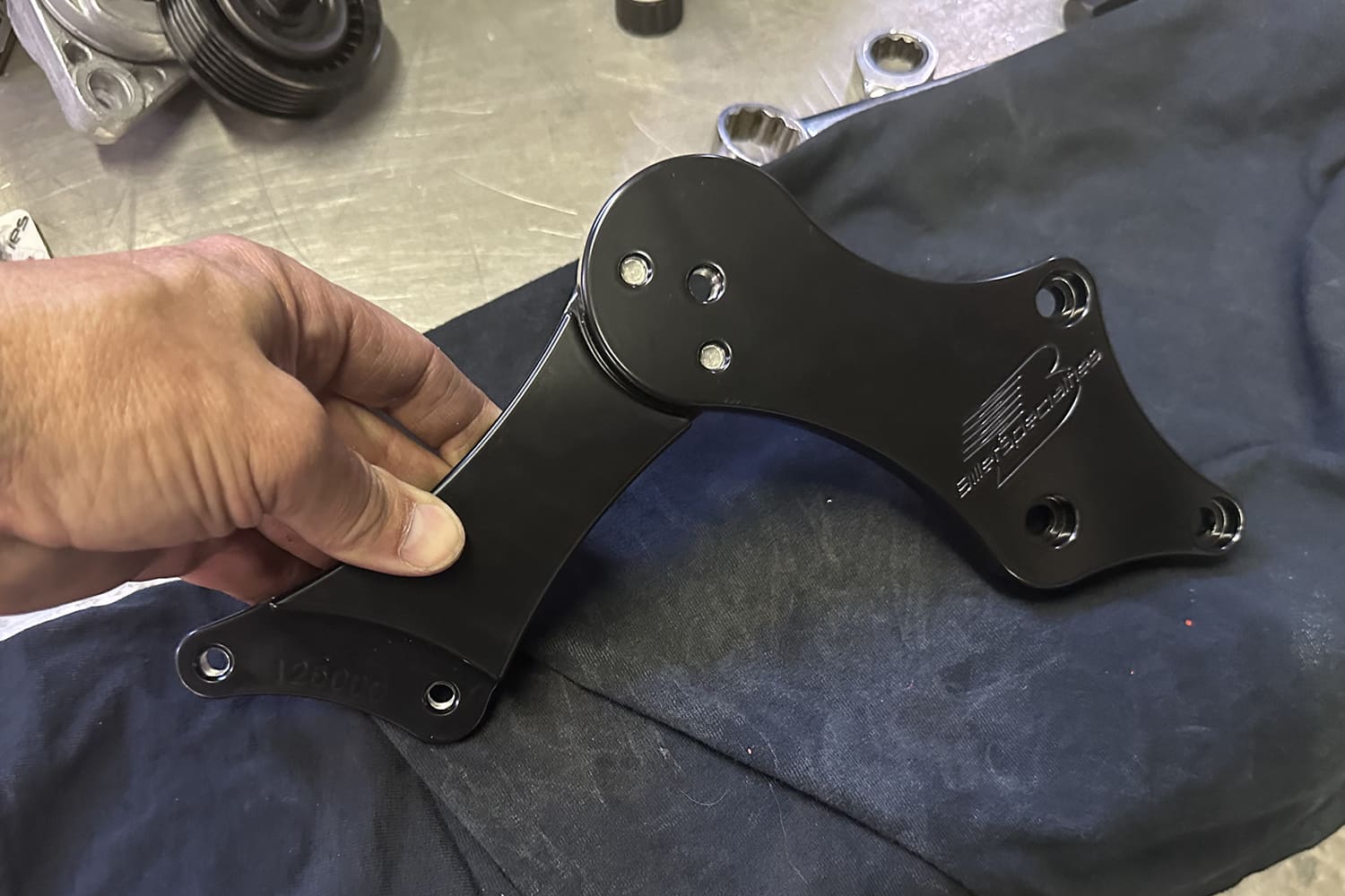 19 Final bracket assembly showing Billet Specialties branding and three point mounting design