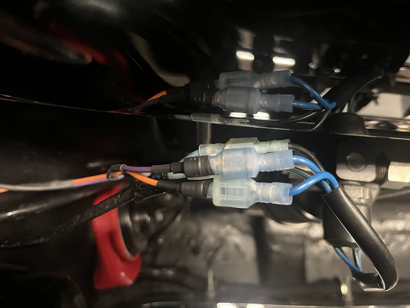 19 Orange purple wires joined with blue output leads using sealed crimp terminals