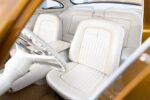 20 1951 Mercury Custom cabin view showcasing full white upholstery and custom trim