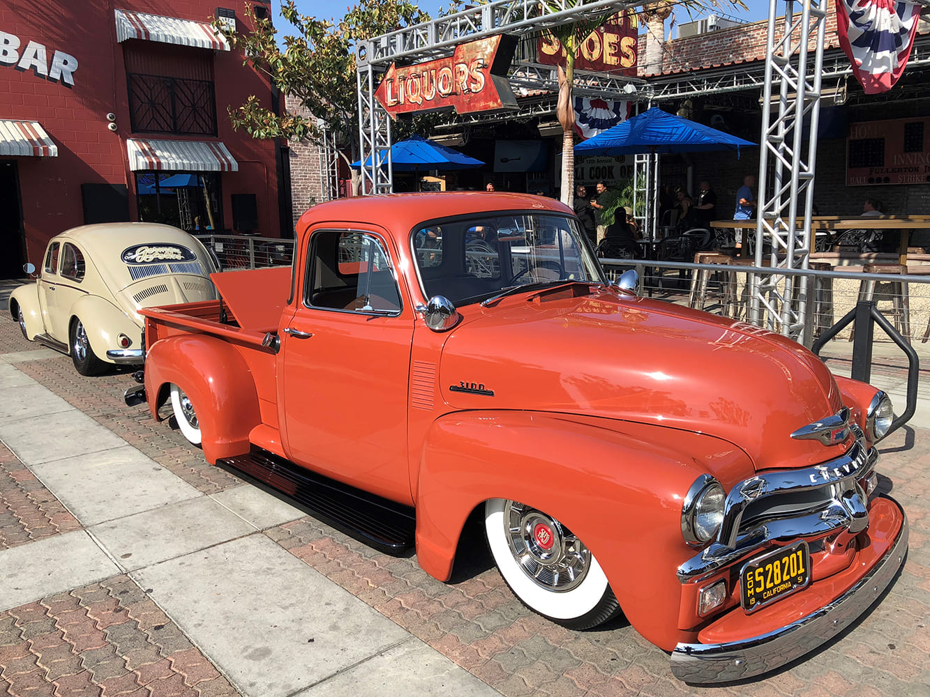 20 1954 Chevrolet 3100 whitewall tires slammed stance parked downtown classic pickup custom rod