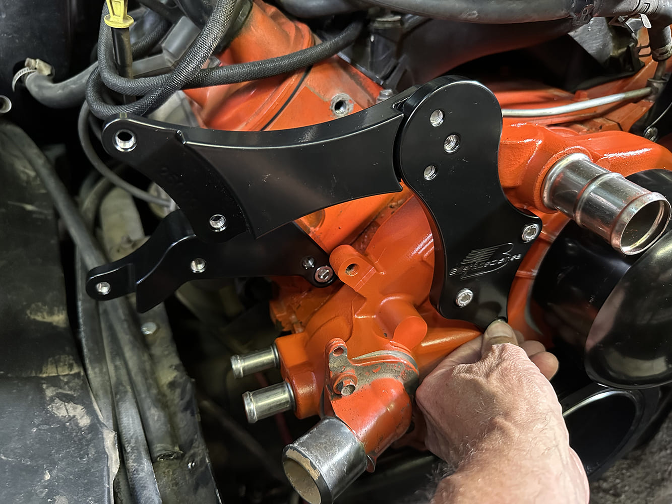 20 Billet Specialties driver side bracket fully installed and torqued on an LS water pump