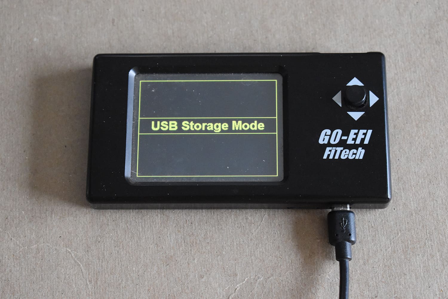 20 FiTech handheld tuner in USB Storage Mode for firmwaredata transfer to and from PC