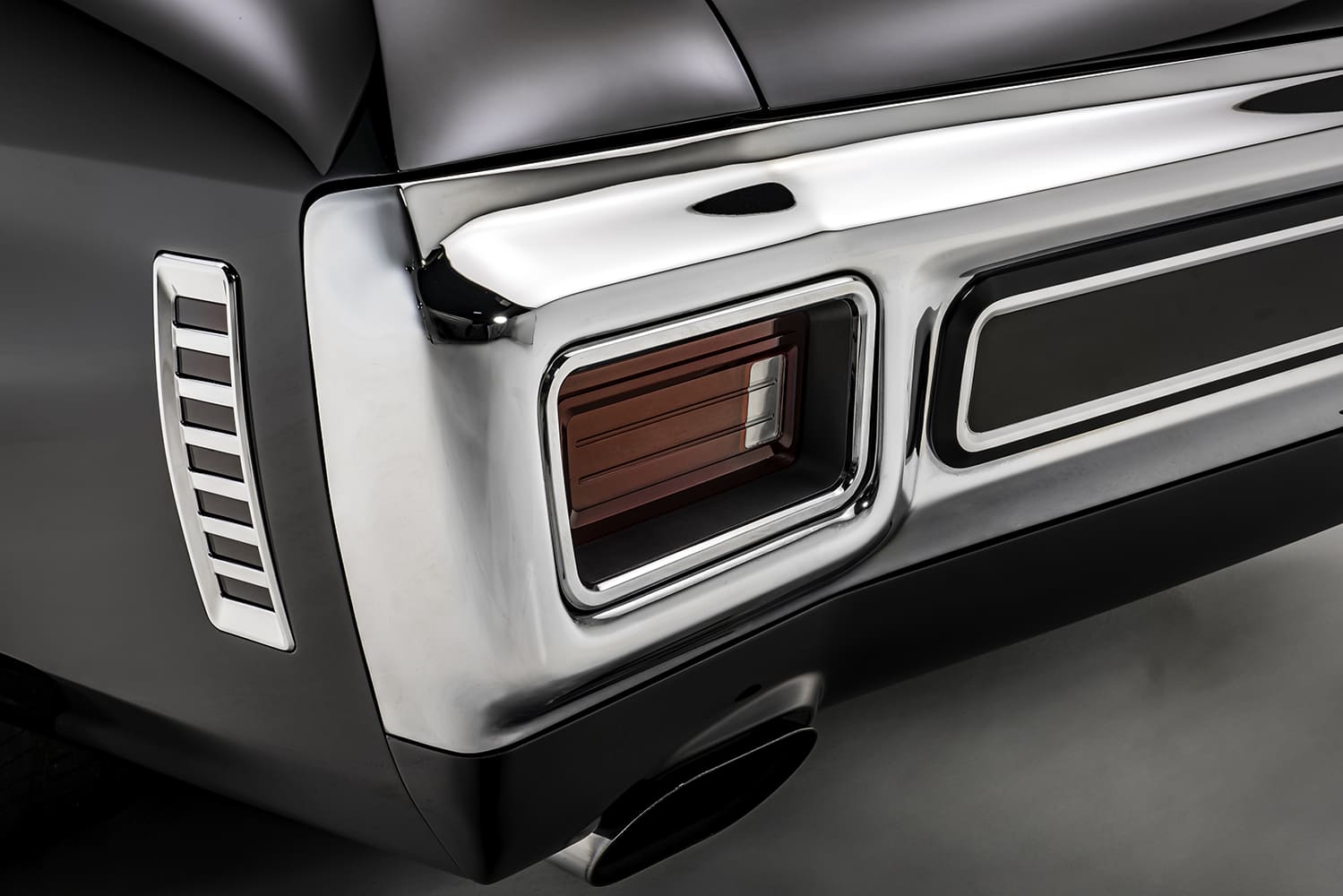 21 1970 Chevrolet Chevelle SS rear closeup with chrome bumper vertical vents and boxed taillight housing