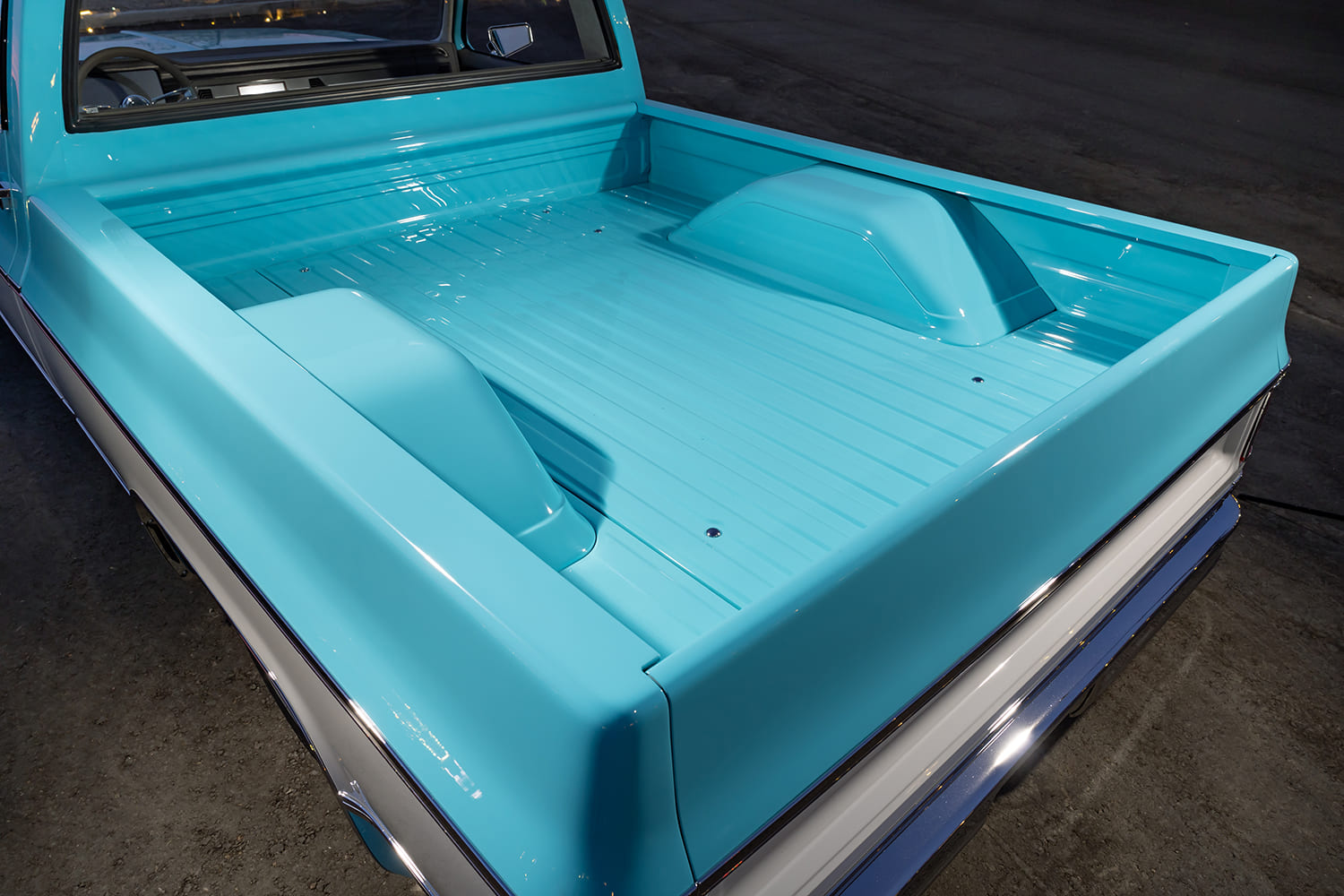 21 1973 Chevy C10 bed tubbed and painted turquoise with hidden fuel filler