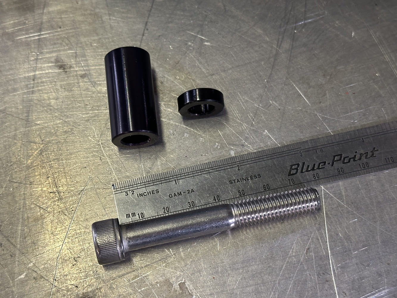 21 Billet spacers and hardware shown with precise measurement for accessory alignment