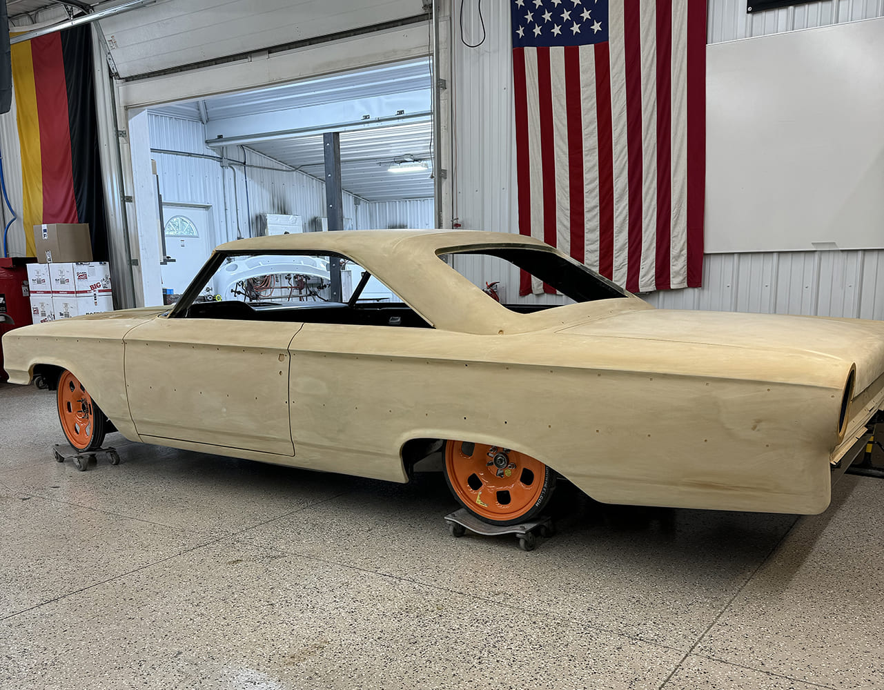 22 Full body skim coat applied to 1963 Galaxie with blocking underway on new sheet metal