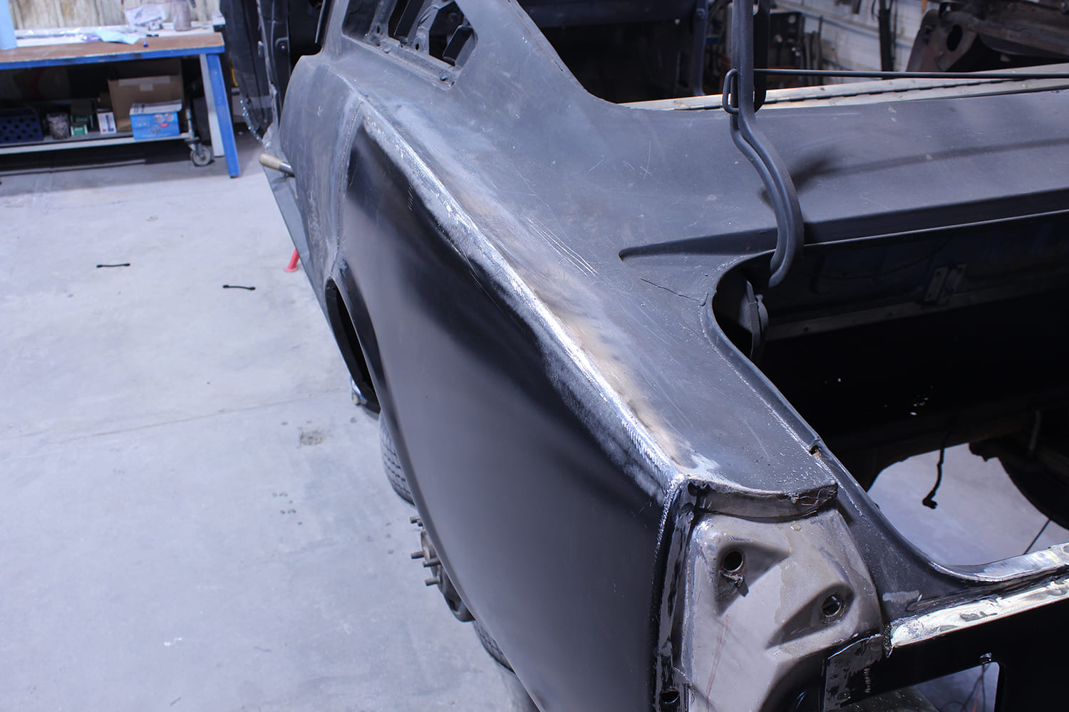 23 welded seam feathered into original body line 1965 mustang