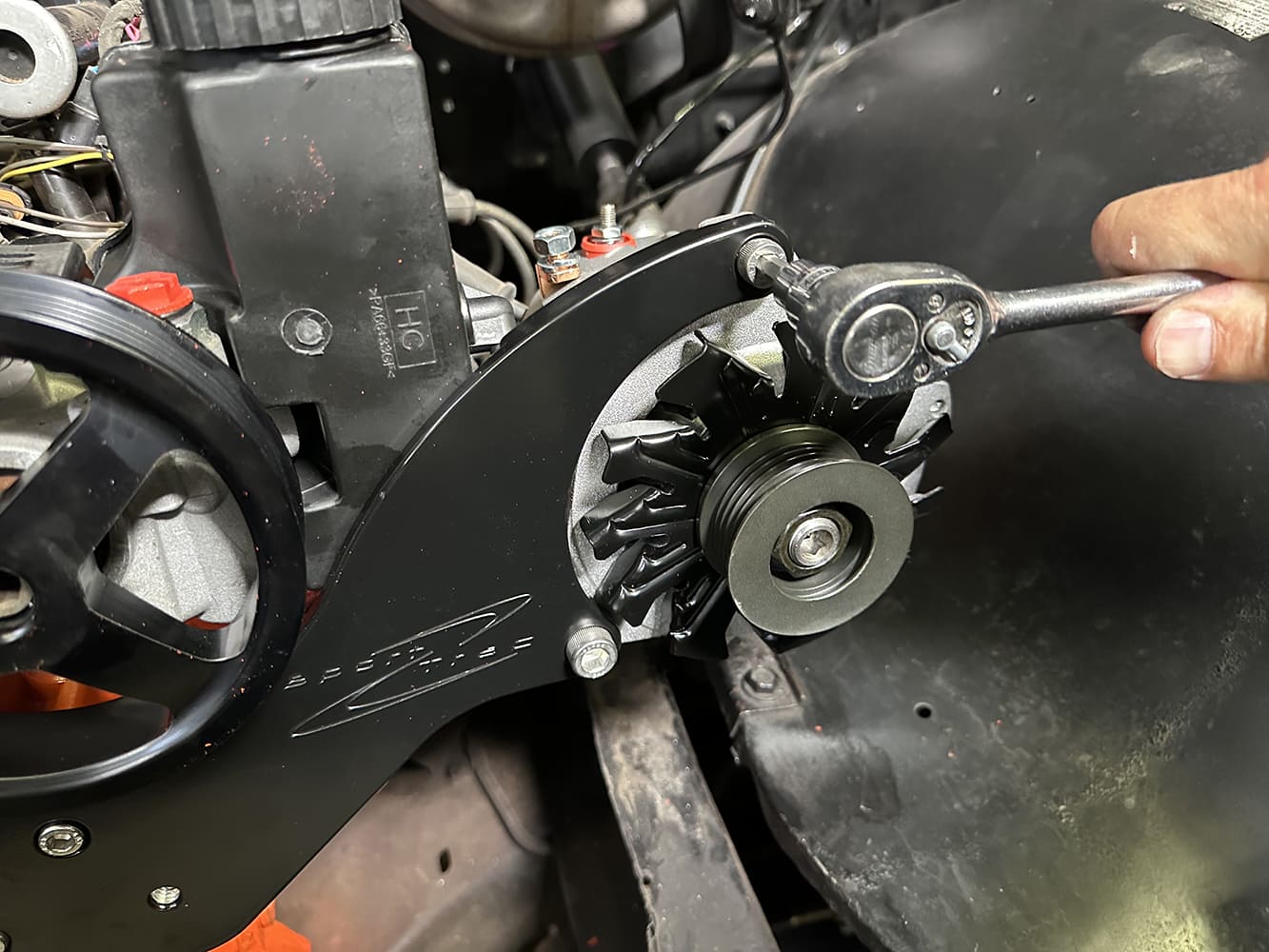 25 Powermaster alternator bolted up to passenger side Billet bracket