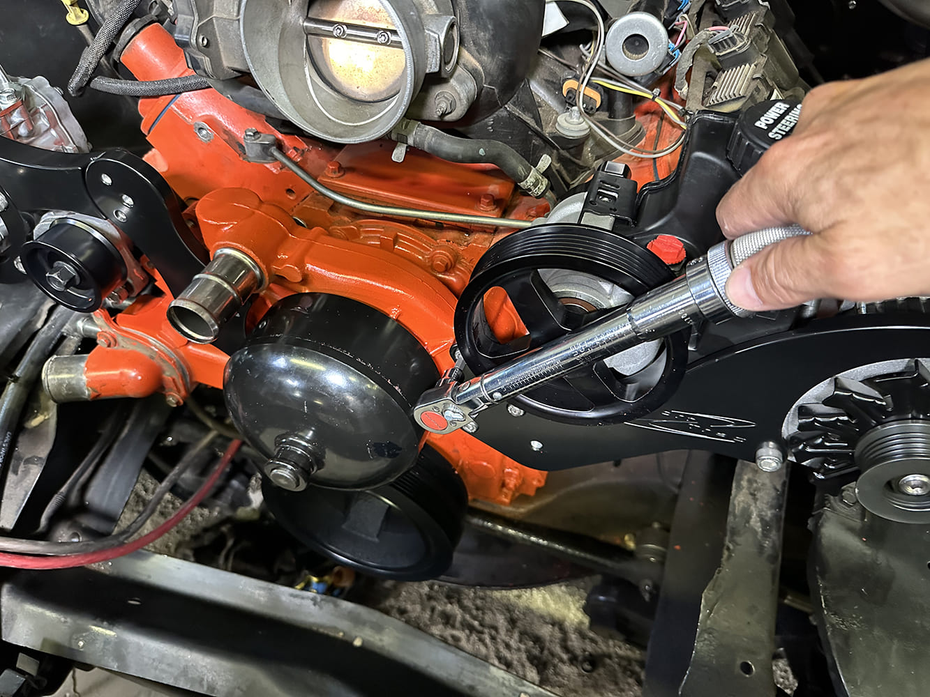 26 Final torque applied to power steering pulley using calibrated torque wrench