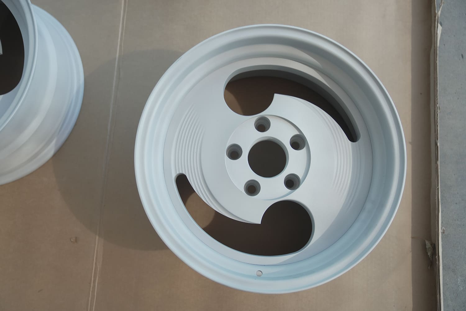 27 Slater wheel media blasted and primed ready for paint