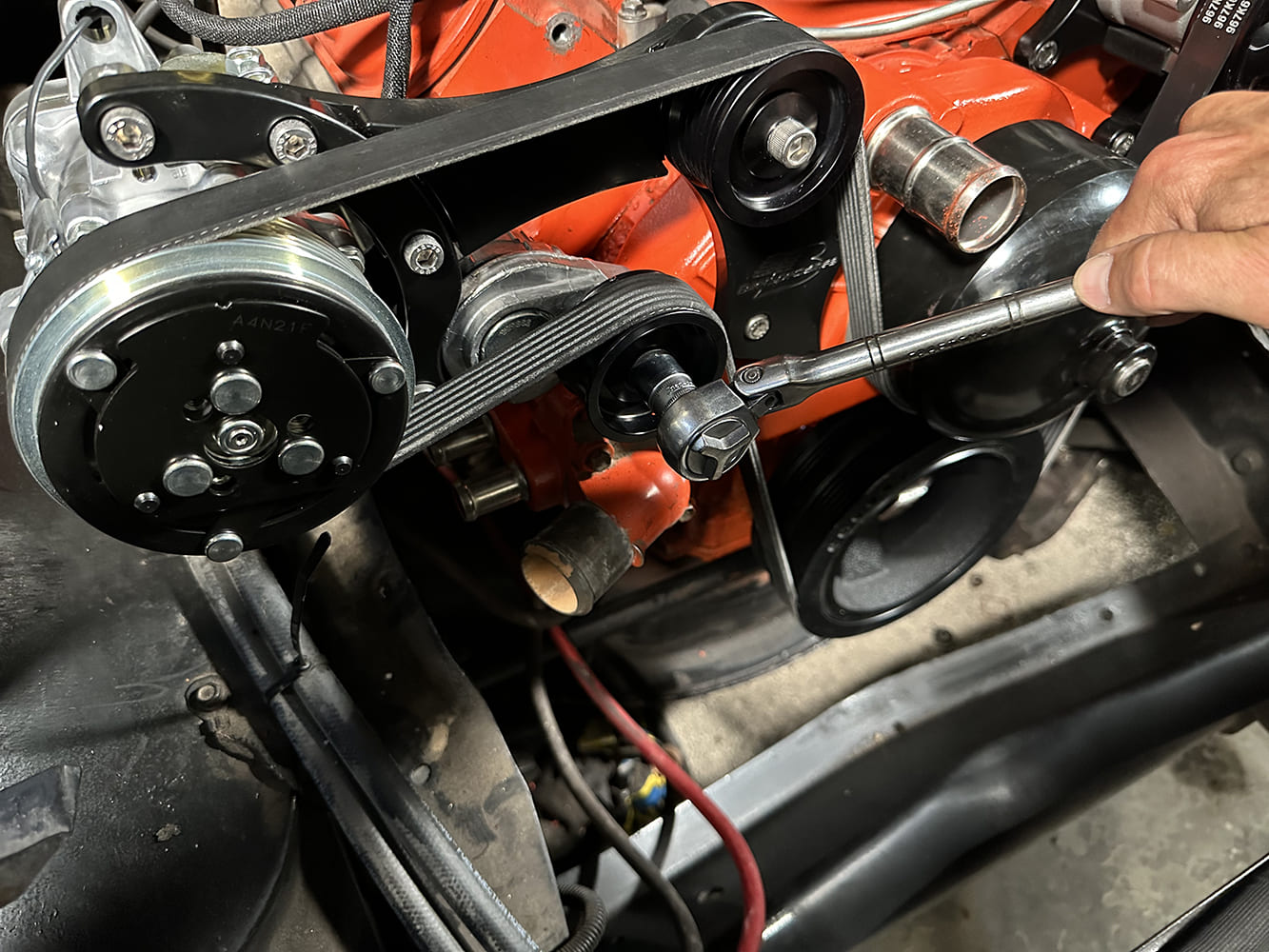 28 Belt tension being adjusted on completed Billet Specialties front drive system