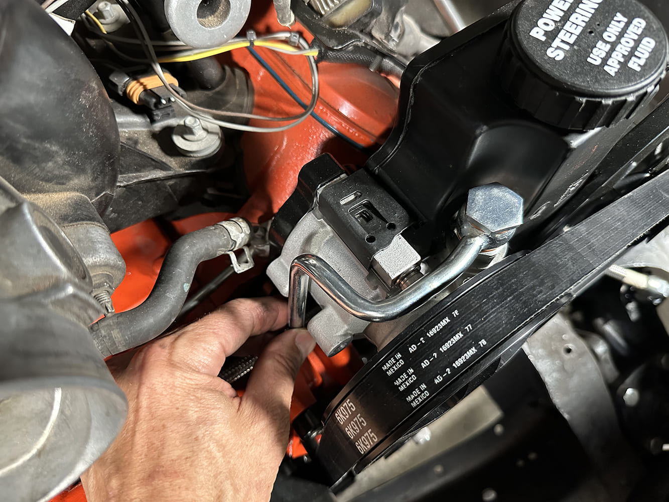 30 High pressure line installed on Billet Specialties power steering pump with belt tension and clearance verified