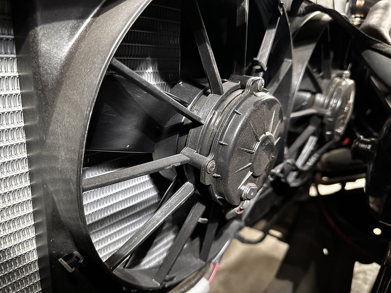 34 Dual SPAL electric fans mounted to shroud with deep blade airflow design for optimal cooling