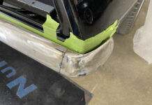 000 1969 Camaro rear bumper corner tack welded and metal finished for seamless body line integration